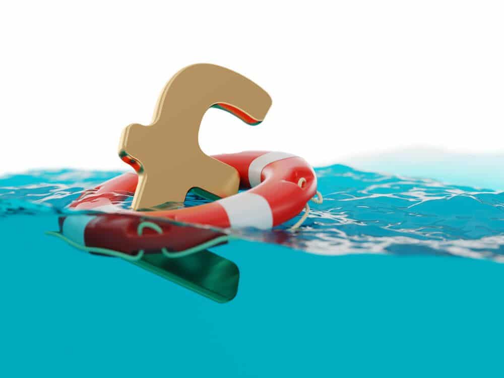 GBP currency floating in the water with safety round